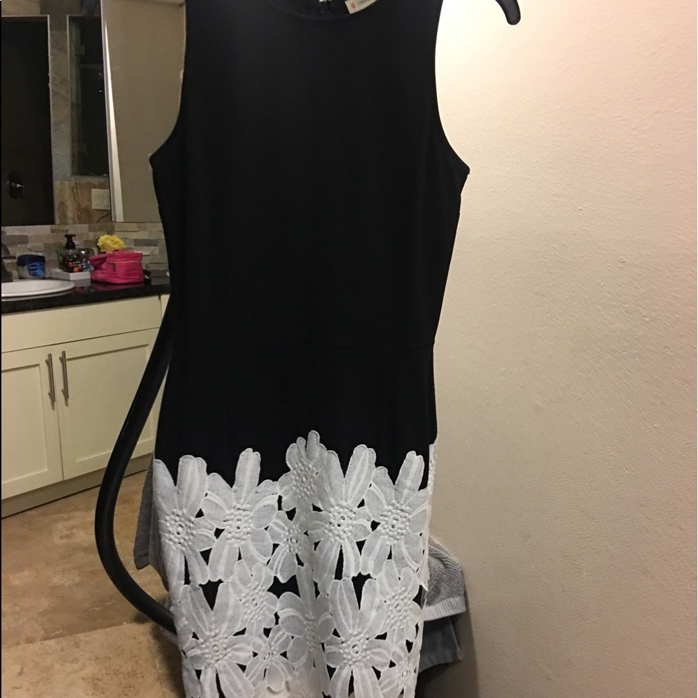Black dress with white lace on the bottom